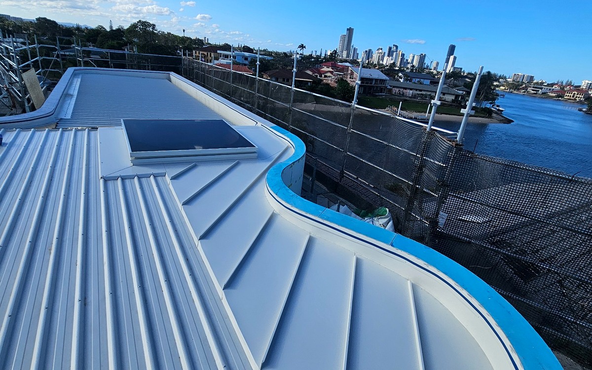 Custom curved roof and skylight installation